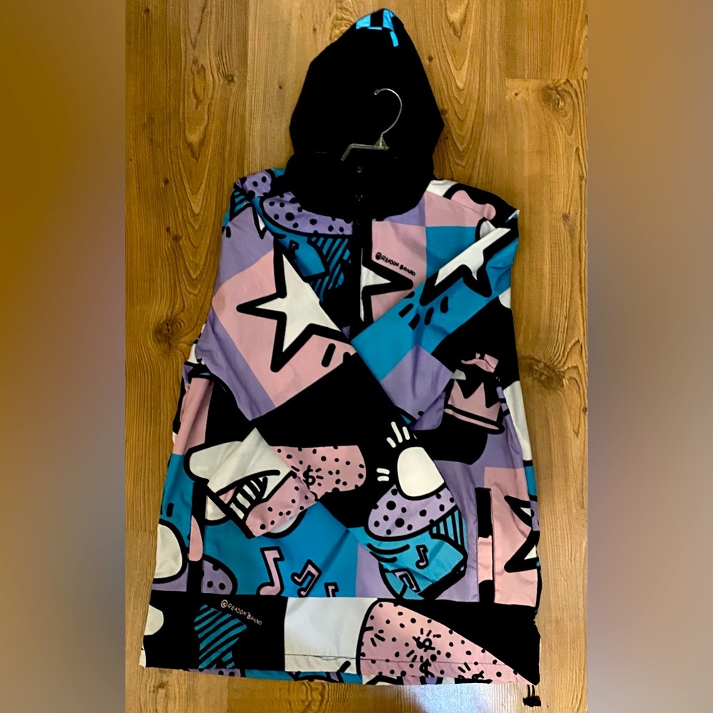 Reason brand windbreaker, size M, color- teal, pink, white, black, and purple